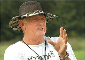 In 2011, after working with Lou Cella as Camp Director, Seminole County (GA) broke the school record for wins in a season and advanced to the Georgia Class A state quarterfinals.

"I have been coaching high school football for 40 years now and began with the wishbone offense, so I had a good background in option football. After spending 7 years with my high school coach and running the power game from the I-formation during the late 70's and early 80's I changed schools and incorporated the I-power with the option and ran this offense for years. When the midline came along we added it to the inside and outside veer, but still stayed exclusively with the I-formation.

"I give you this background because 'old dogs can not———'.

"It just so happens that my youngest son is working with Ken Niumatalolo at the Naval Academy as an offensive line coach and run game coordinator. My oldest son is the head football coach at Riverwood High School in Atlanta, Ga., and has been running the flexbone for several years, but 'old dogs——'.

"It just so happens that I finally decided to play around with the flexbone during the past two years and thought I knew what I was doing. I gave Lou a call and we hit it off immediately so we set up a camp in Atlanta with my team and Robert's team at Riverwood during last summer (2010). I learned so much at the camp that we ran the flexbone almost entirely during the 2010 season and the results were unbelievable.

"23 school records including an 11-2 season, the elite 8 in the playoffs (should have won the state bit 5 fumbles in the first half after only losing only 8 during the whole season and playing a metro Atlanta Private School - yes we have problems with recruiting in Georgia like the rest of you do). We rushed for4,373 yard, our Two A backs averaged 11.8 and 10.4 yards per touch, we scored 71 touchdowns and averaged 49 points per game (most games were over with by half with a running clock during the second half). Overall, our backs averaged7.9 yards per carry and that includes the J.V. backs who had over 135 carries collectively for the season. We also threw the seam routes for 880 yards and scored 9 touchdowns. That gave us 80 offensive touchdowns for the 13 game season.

"Lou did an outstanding job at the camp I personally consider him one of my closest friends because he is always avaiable to help. He does such a great job of installing fundamentals and mechanics.

"This was the first 11 win season in school history so remember 'old dogs can'."

- Alan Ingram, Head Football Coach