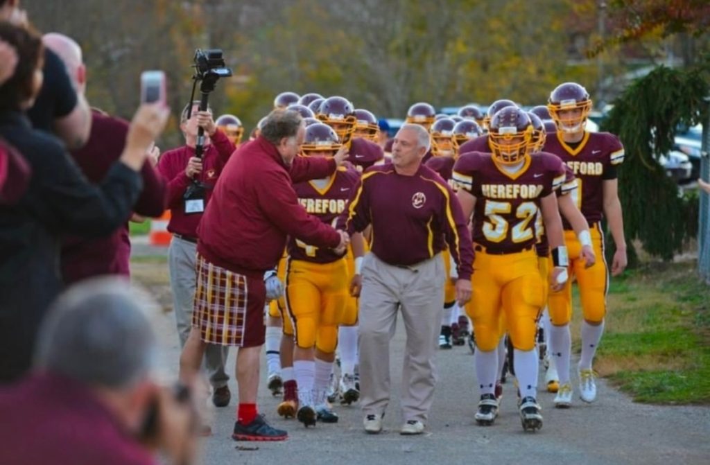 In 2013, after working with Triple Option Football Academy Owner, Lou Cella, Hereford HS (MD) won the Baltimore County Division I Football Conference Championship in Head Coach Steve Turnbaugh's final season as Head Football Coach. After Hereford's seventh-straight win in 2013, Steve retired after a 19-year career coaching his son, Brock, and coaching at his alma mater. "We did the academy this past off-season. In my opinion it was worth every penny we invested. We had been running the triple since 2005. I attended Navy clinics, other clinics, bought videos etc… "However, I picked up more during those sessions with Lou than I ever could imagine. If I had questions, Lou was there with an answer. "We lost many players from our 2012 team. We were basically starting from scratch with our 2013 team. The academy had us prepared for any situation. Though we started 0-3 (many injuries, including using a # 3 QB) we finished winning the last 7 games. "Though this was my last season, I am still involved in the triple option and would run that offense in a second, if I do decide to resume coaching again. "Thank you Lou for all your time. It was well worth it." - Steve Turnbaugh, Head Football Coach BUT WAIT… Then in 2019, Steve returns to Hereford as an Assistant Coach, Hereford hires Dr. Cella AGAIN, starts the season 0-3 AGAIN, and wins their next seven games AGAIN.